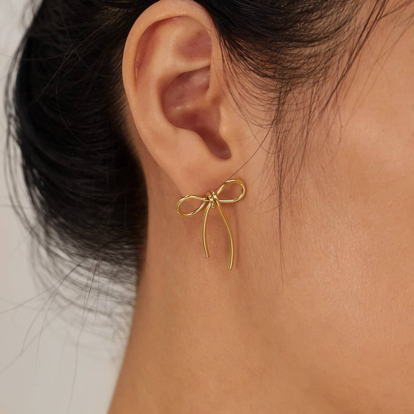 Slim Ribbon Bow Earrings in Gold
