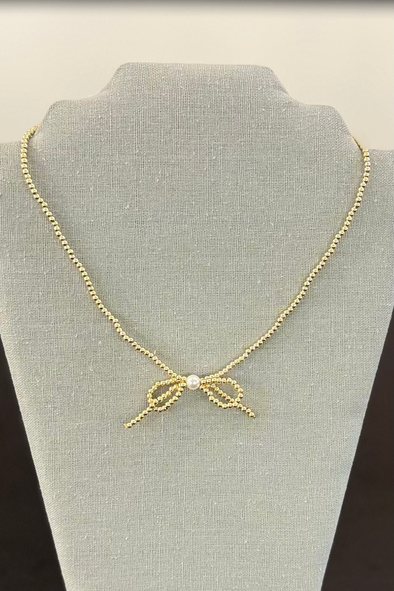 Alex Carol 3mm Gold Ball with Bow and Shell Pearl Splash Stack Necklace