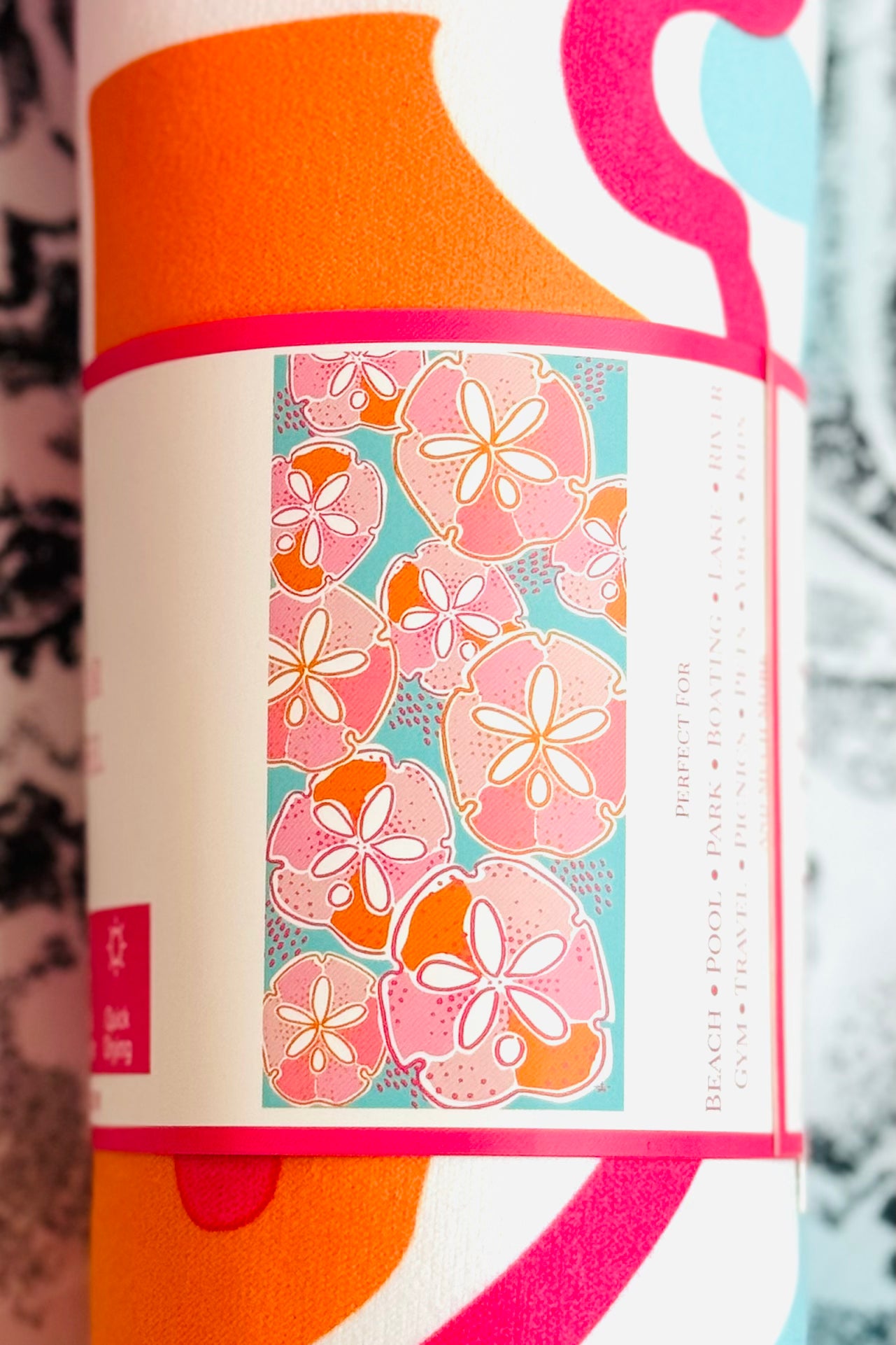 Sand Dollar Microfiber Beach Towel in Aruba Blue, Pink, Orange, and White