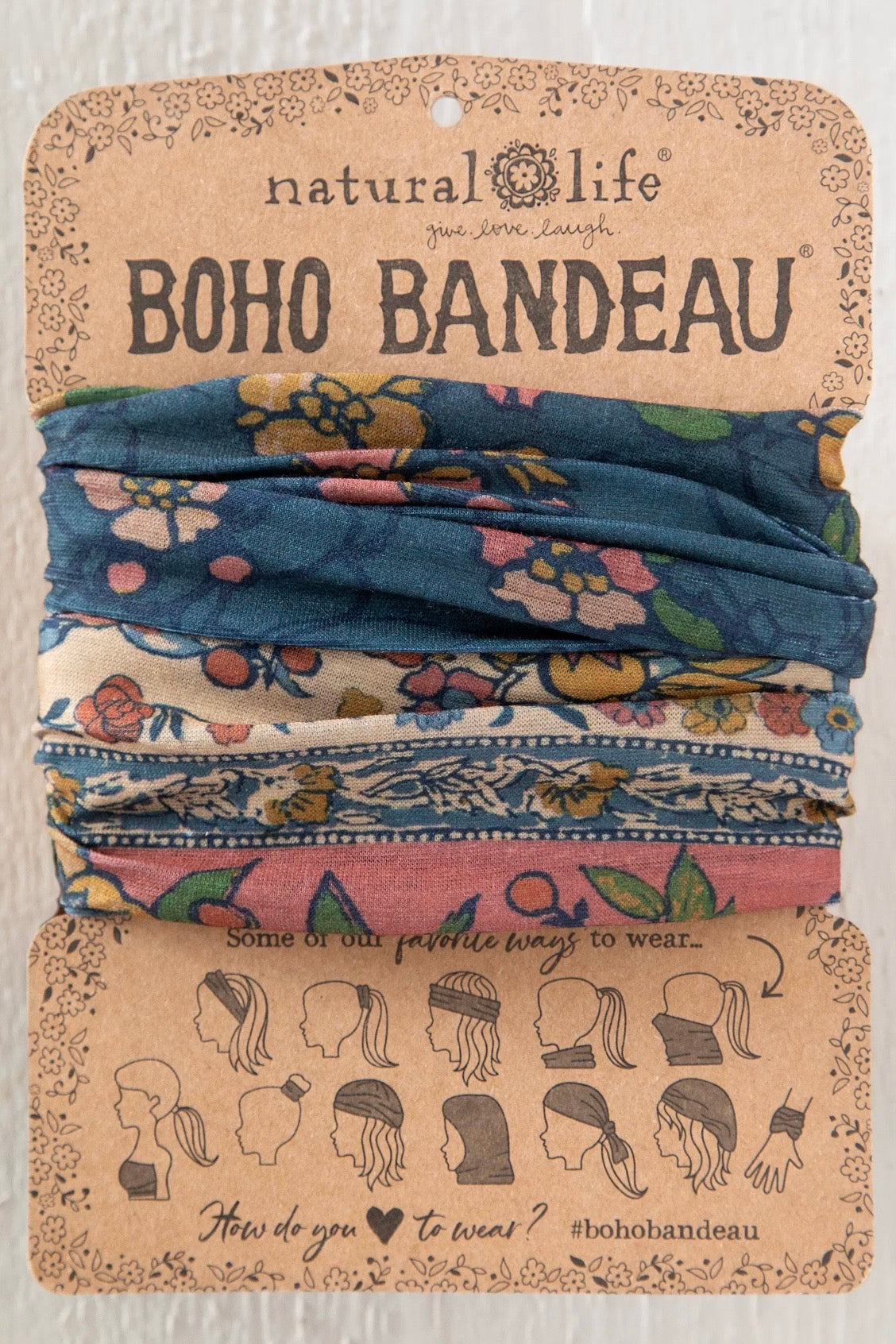 Natural Life Boho Bandeau headwrap set in kraft paper packaging, featuring multiple fabric wraps in floral and patterned designs including blue, pink, and beige.