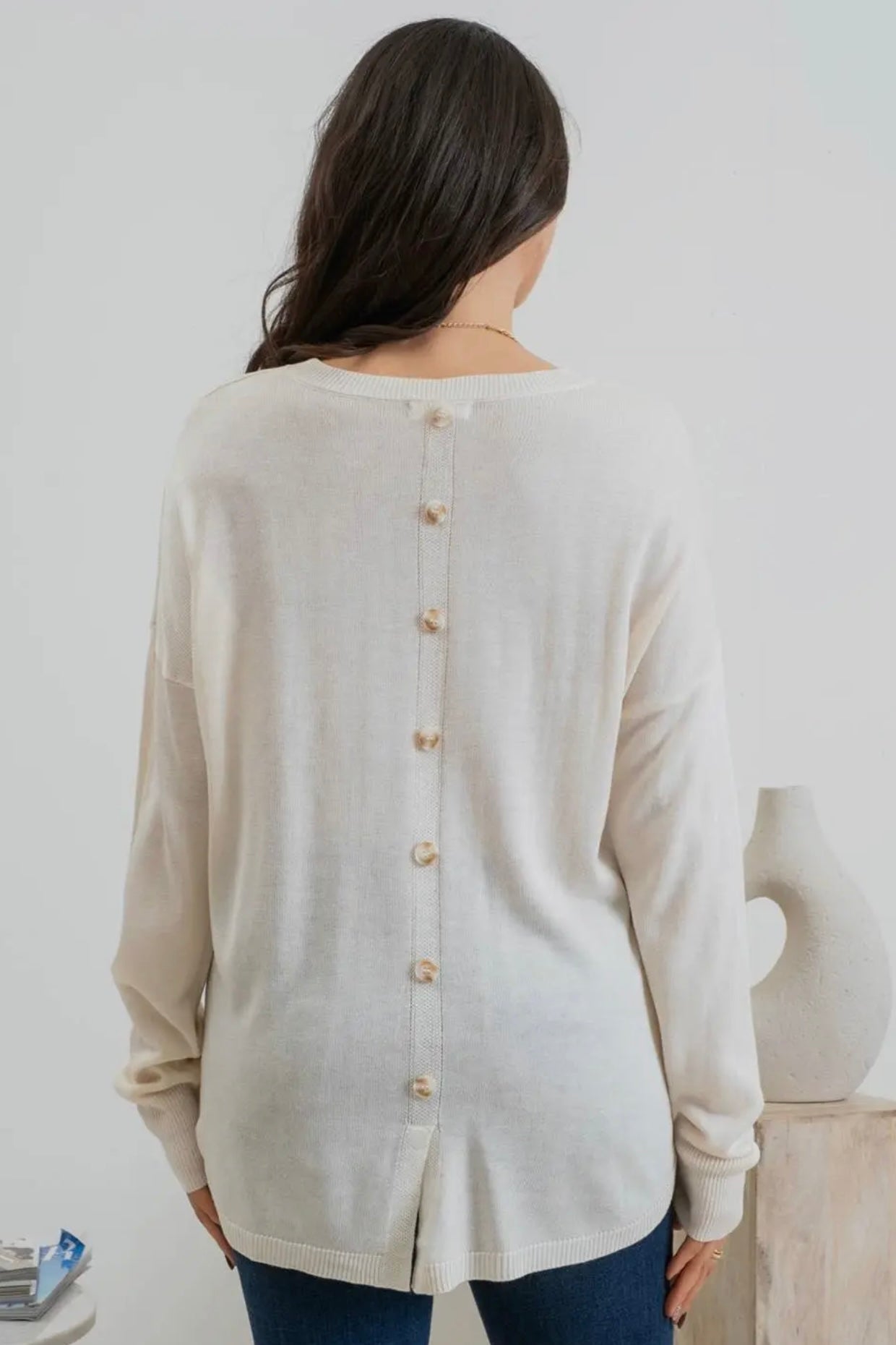 Round Neck Long Sleeve Button Back Sweater with High Low Hem