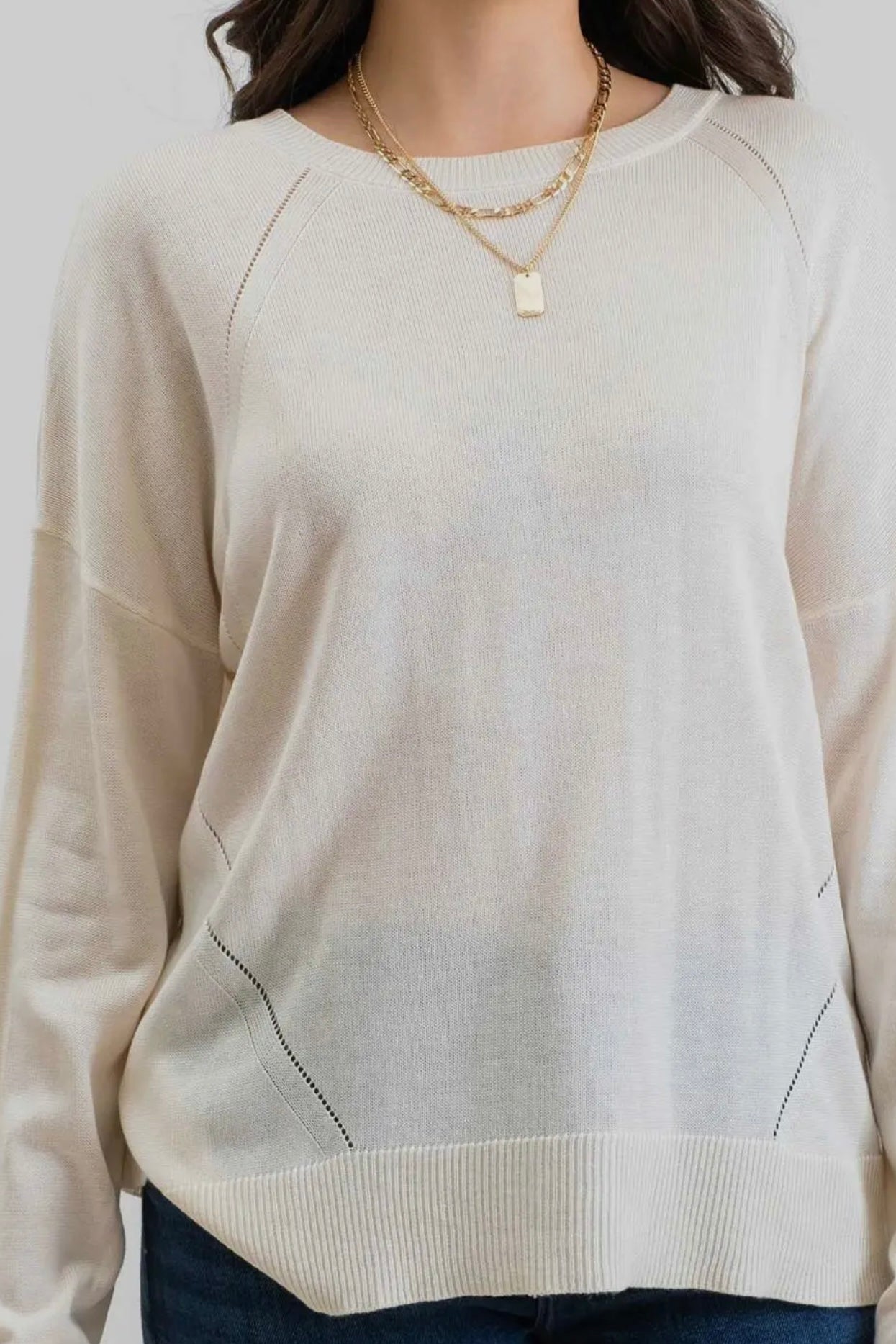 Round Neck Long Sleeve Button Back Sweater with High Low Hem