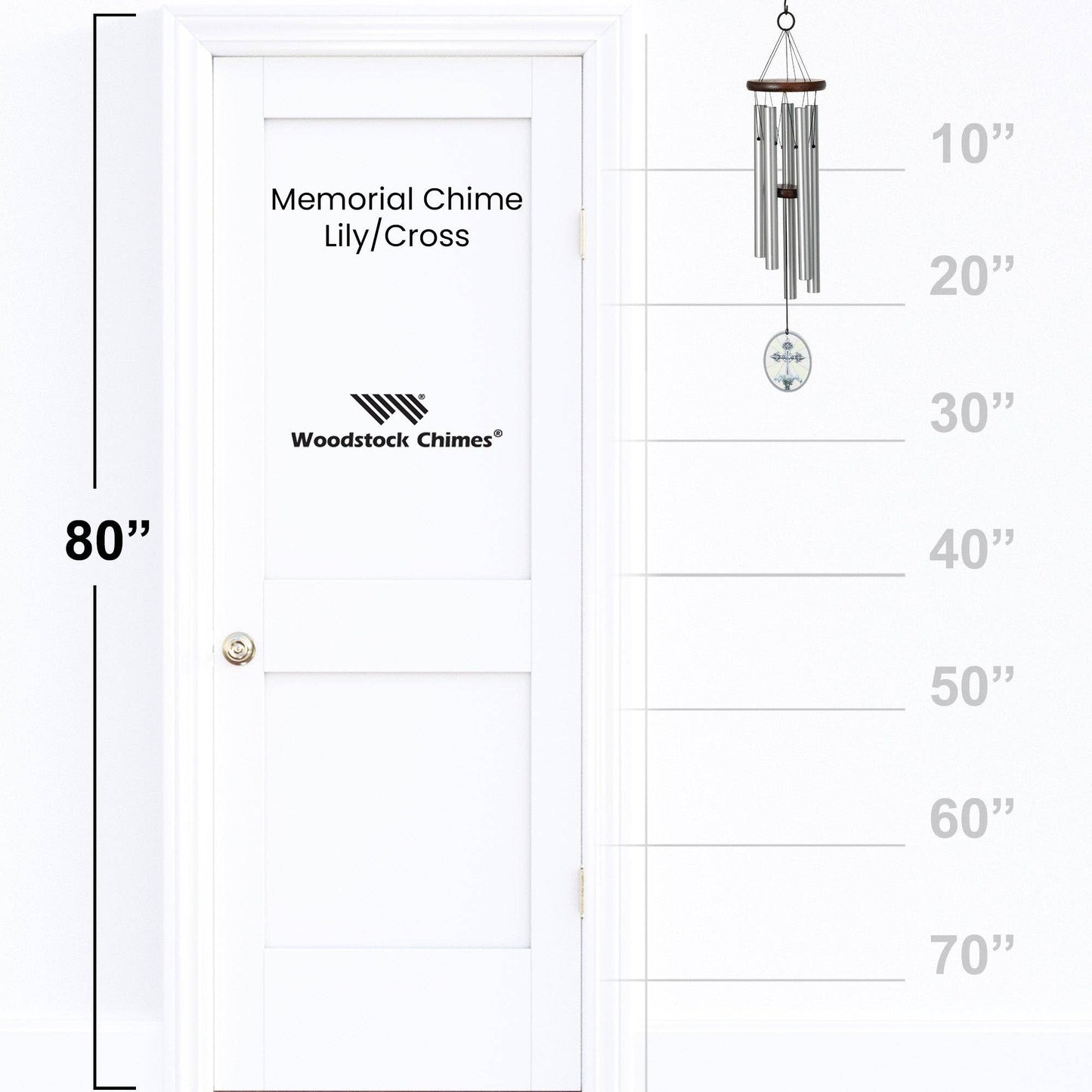 Woodstock Chimes Memorial Chime Lily/Cross with measurement scale on a white door background