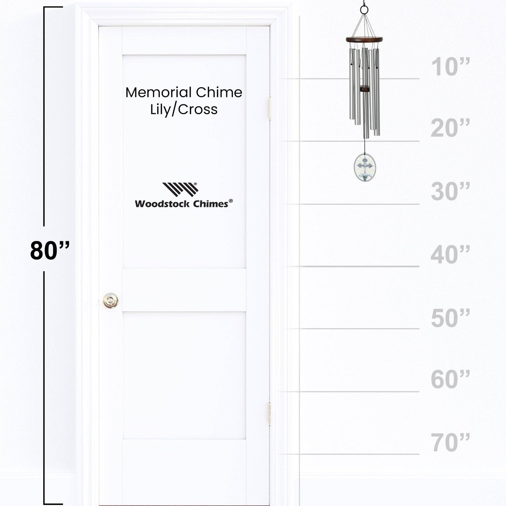 Woodstock Chimes Memorial Chime Lily/Cross with measurement scale on a white door background