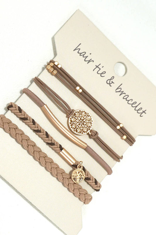Set of hair tie and bracelet with decorative elements on a beige card