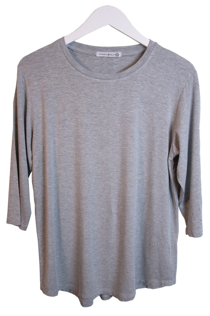 Gray long-sleeve shirt on a white hanger with a white background