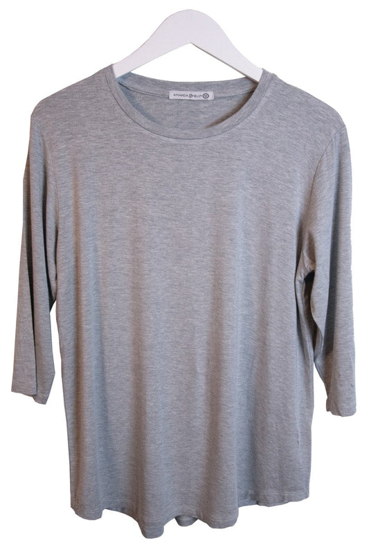 Gray long-sleeve shirt on a white hanger with a white background