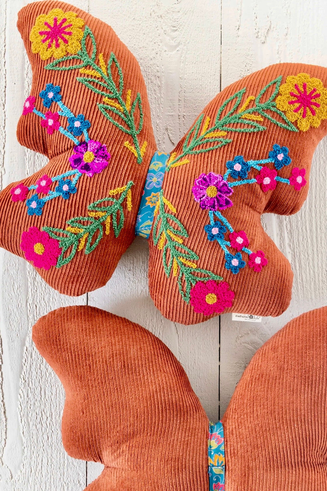 Natural Life Corduroy Tufted Rust Butterfly Pillow