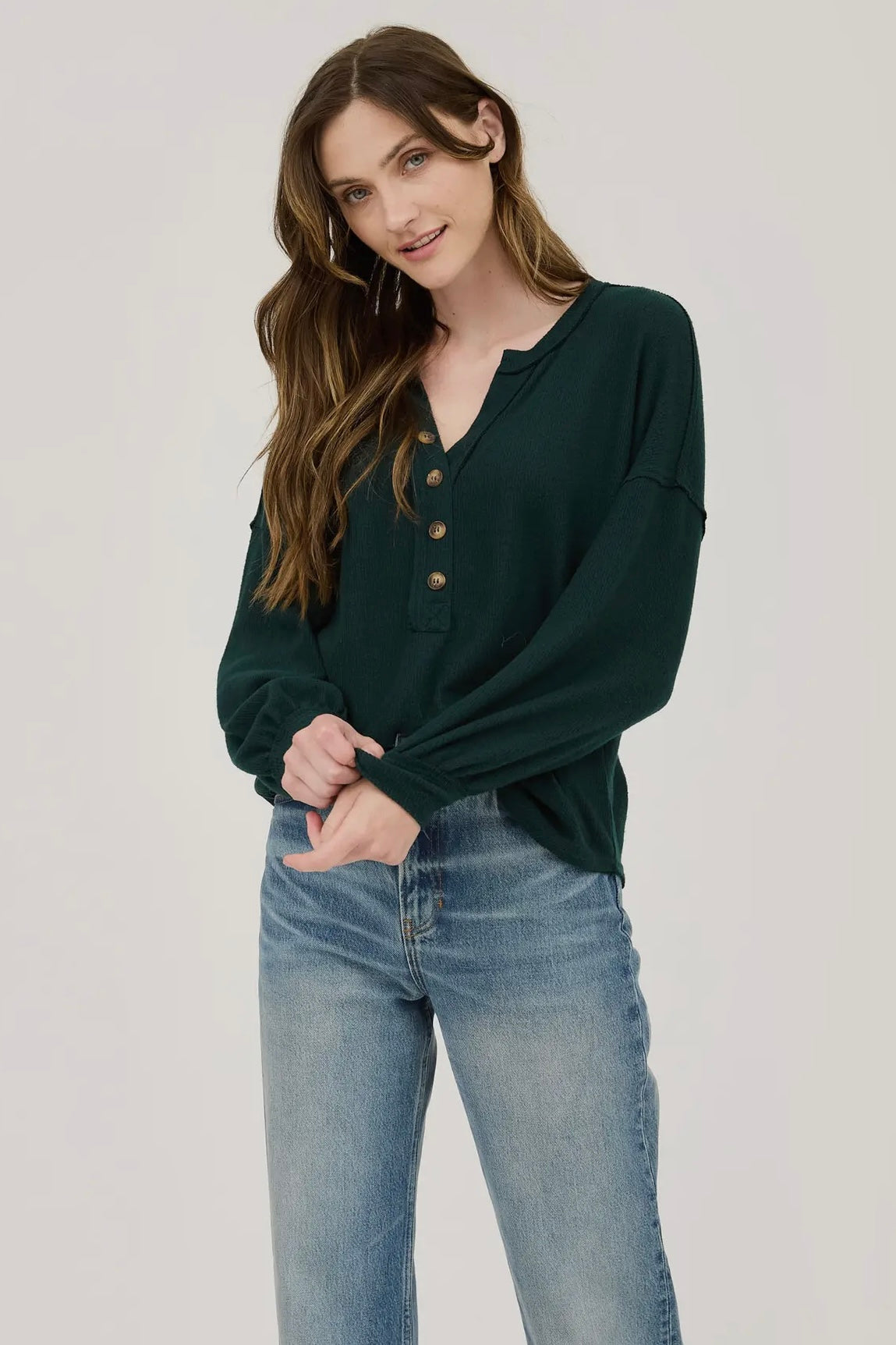 Hunter Green V Neck Long Sleeve Half Button Top with Exposed Seam Detail