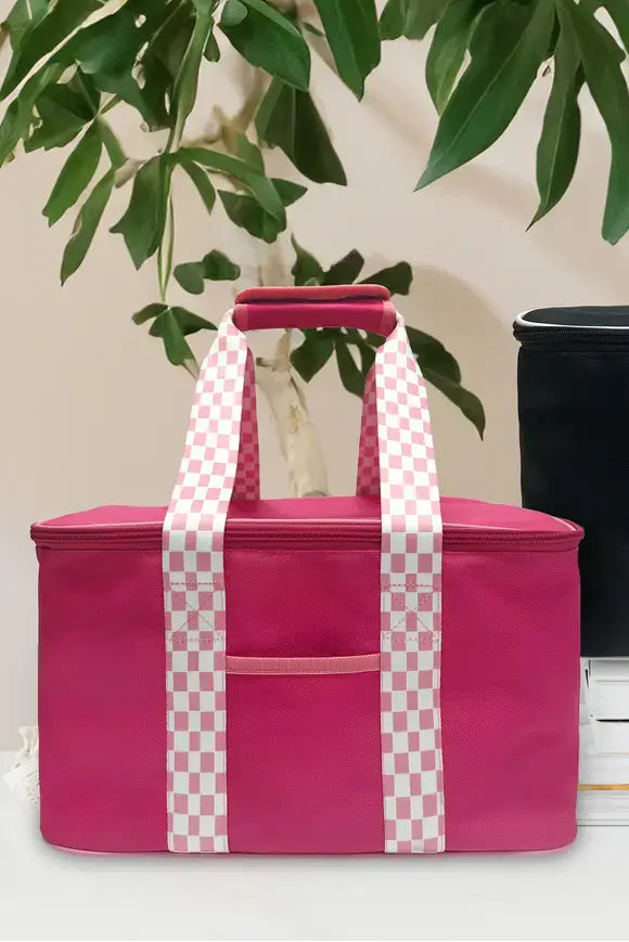 Pink  insulated bags with decorative handles on a neutral background