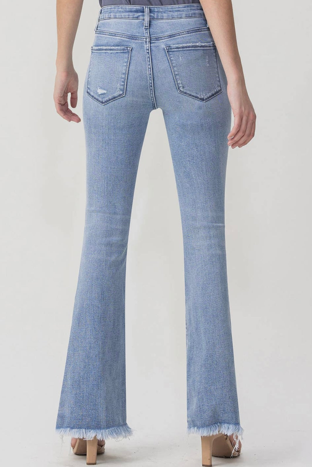 High Rise Stretch Slim Flare Fray Hem Jean in Light Denim