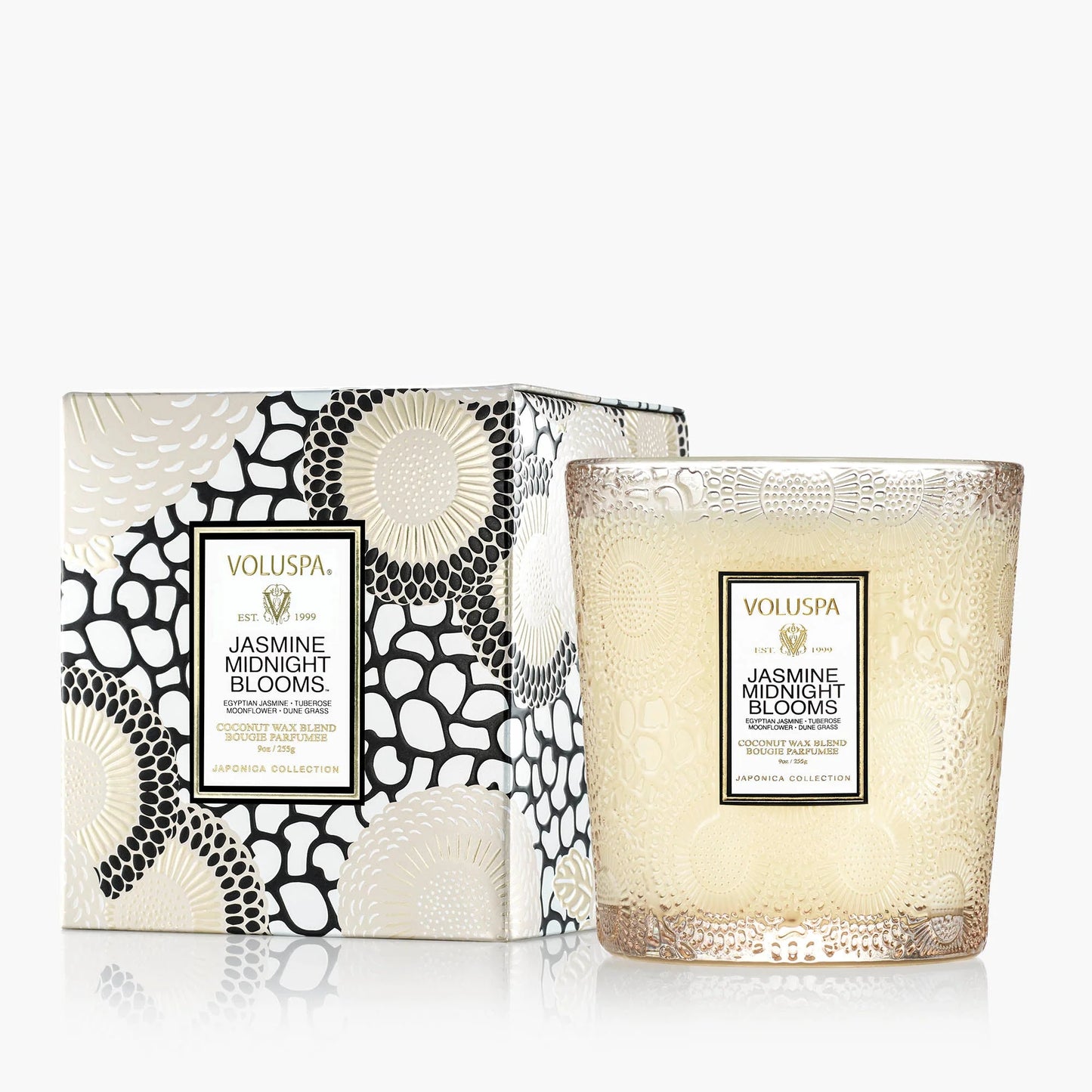 Voluspa candle with packaging on a white background