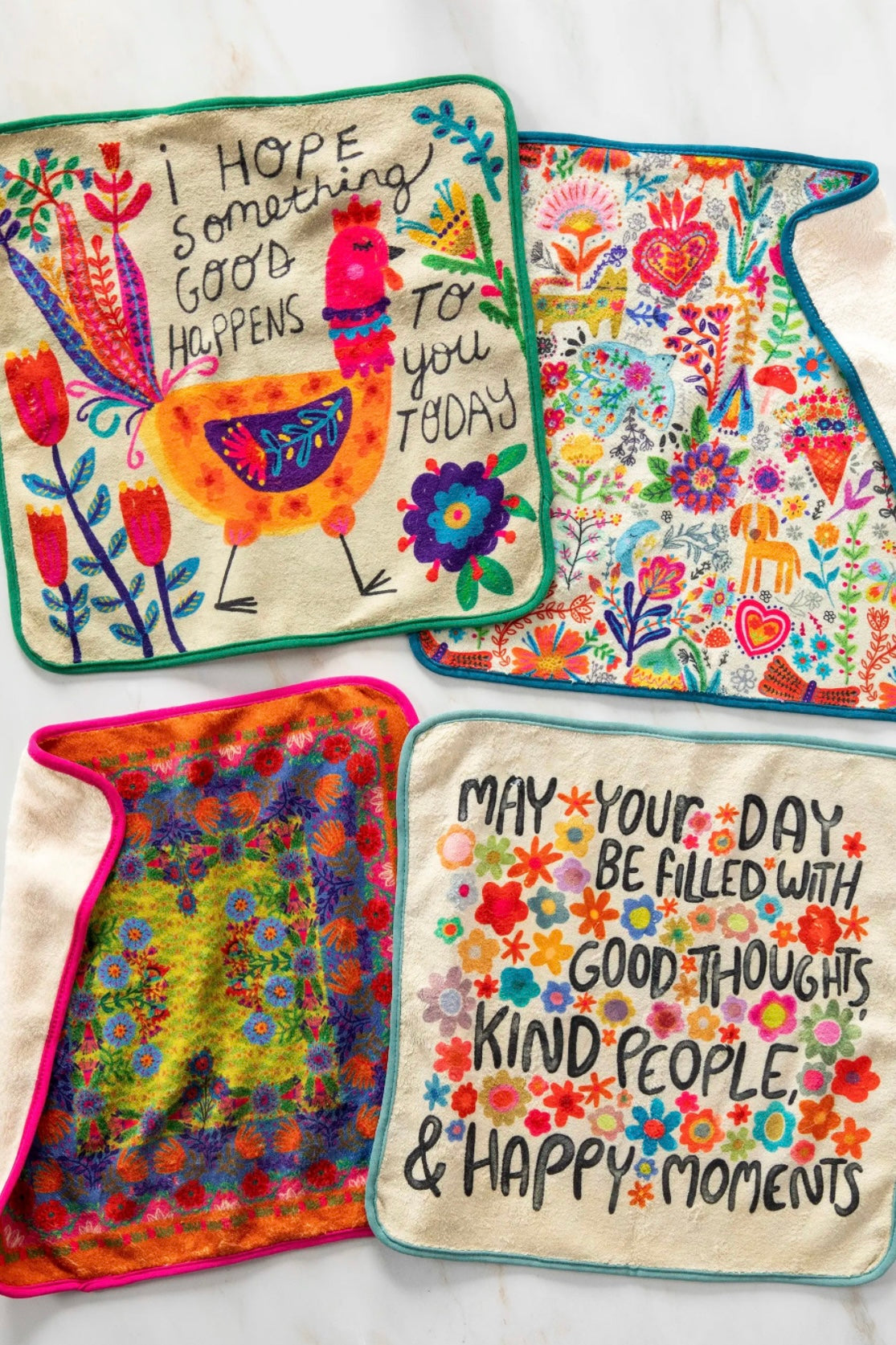 Colorful WASHCLOTHS with floral designs and motivational text on a white background