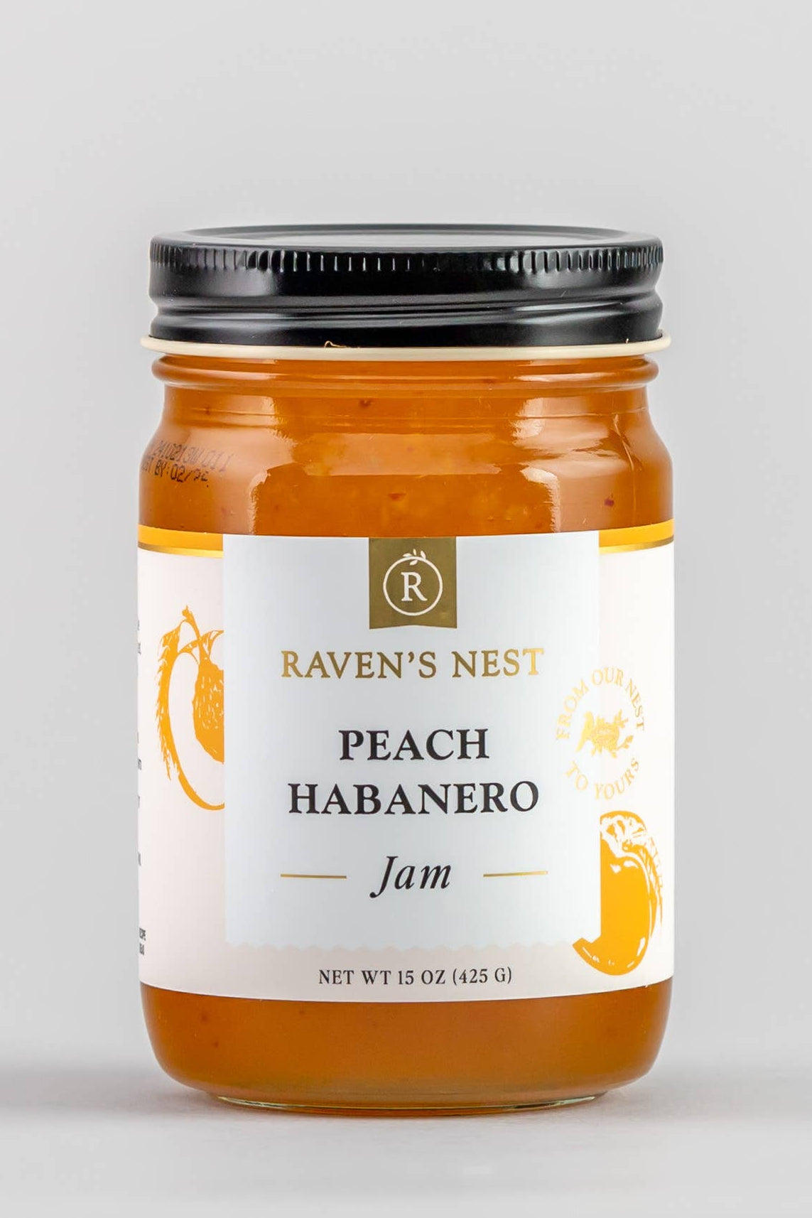 Jar of Peach Habanero Jam from Raven's Nest on a gray background