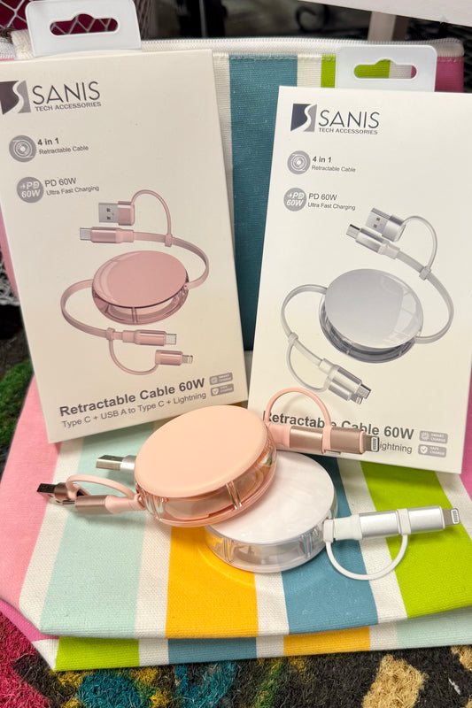 Retractable cable 60W with packaging on a colorful fabric background